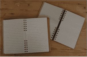 Komoni notitieboek binnenkant navul verpakking