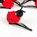 Haarspeldje lieveheersbeestje